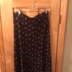 Aeropastel skirt in darkest blue, flower accent